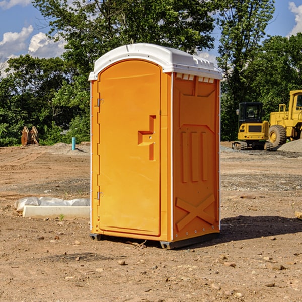 how often are the porta potties cleaned and serviced during a rental period in Rake